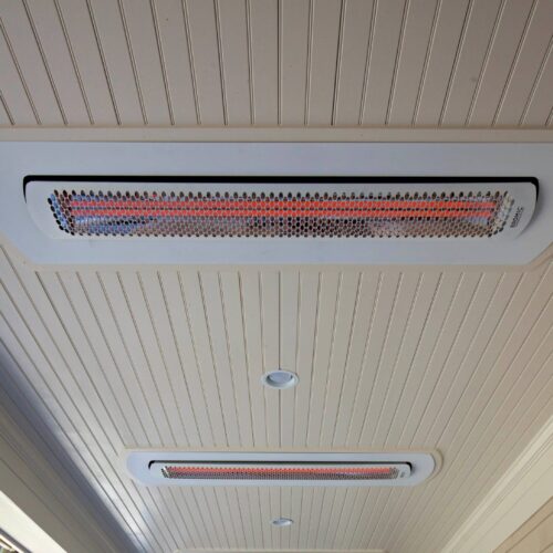 White Electric Heater Recessed into Ceiling on Porch