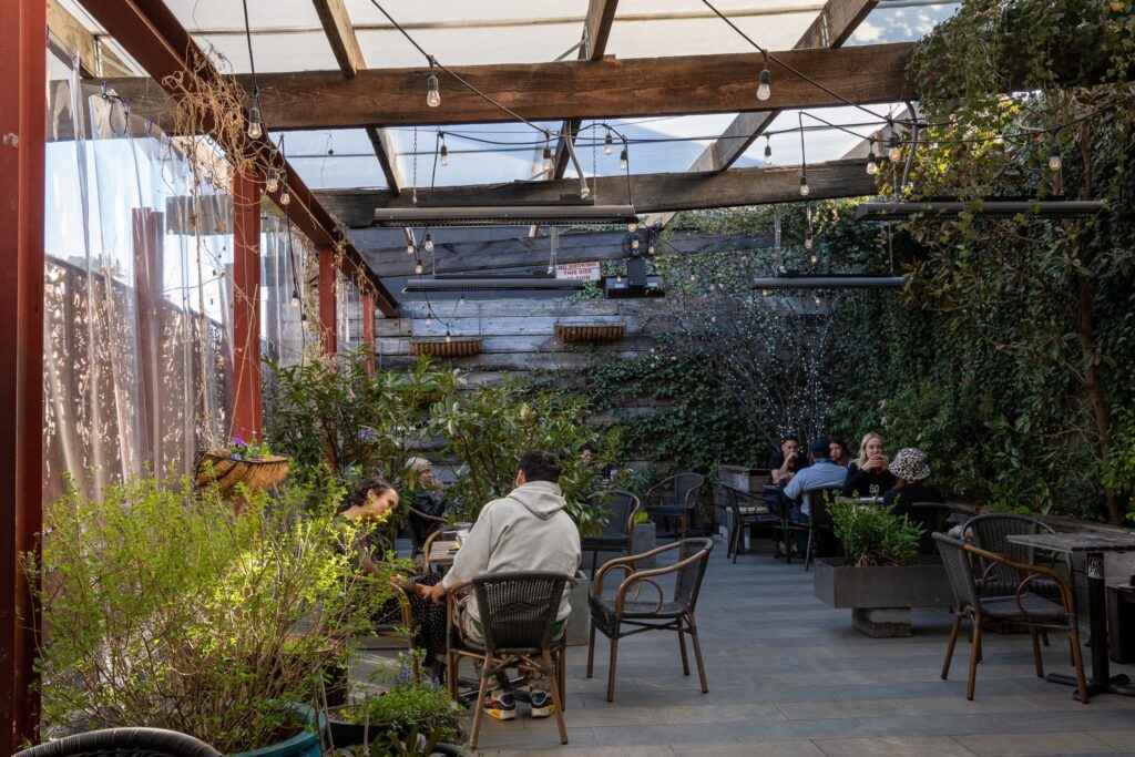 Lush Outdoor Patio with People and outdoor heating