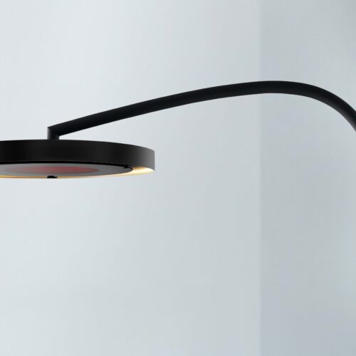 Wall mounted curved electric heater
